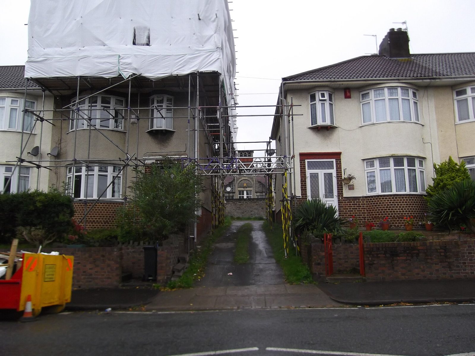 Scaffolding up for roof work on a semi-detached house