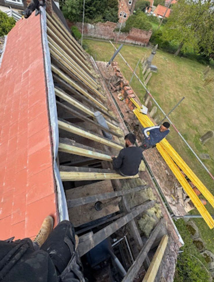 Old roof stripped back to the rafters ready for re-roofing