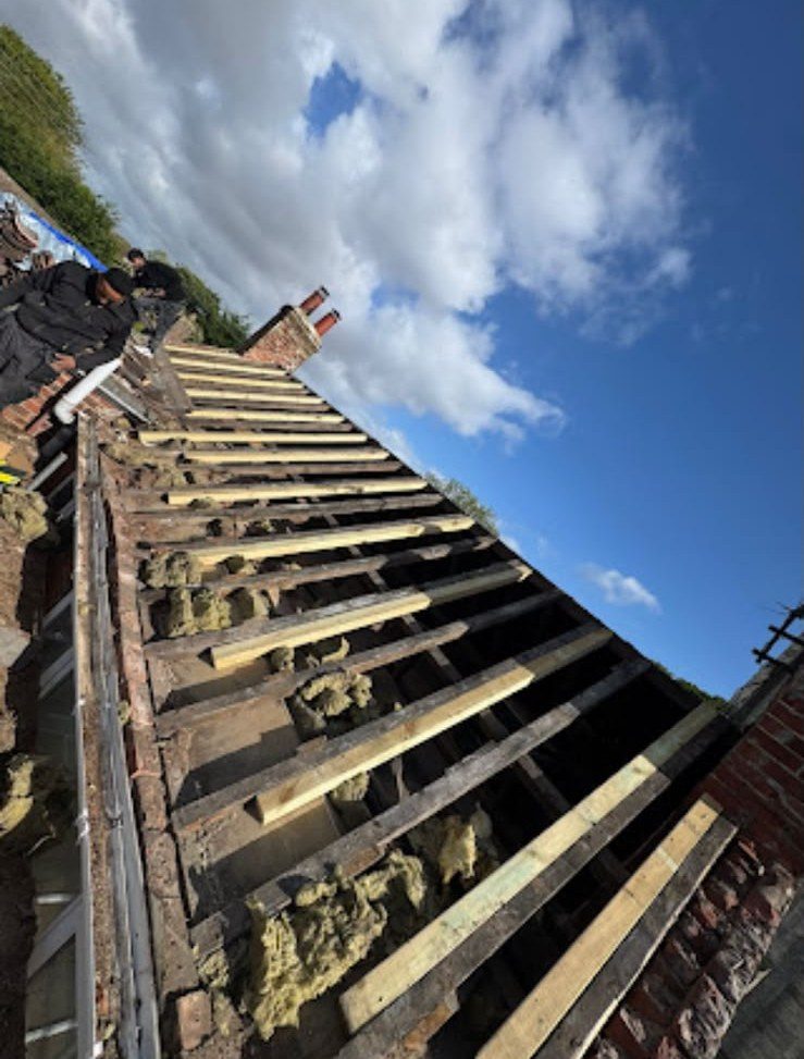 Old roof stripped back to the rafters ready for re-roofing