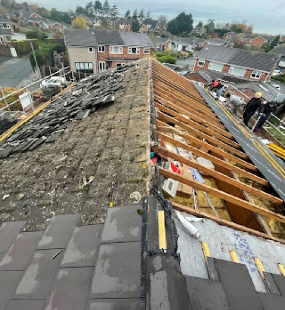 Old roof stripped back to the rafters ready for re-roofing