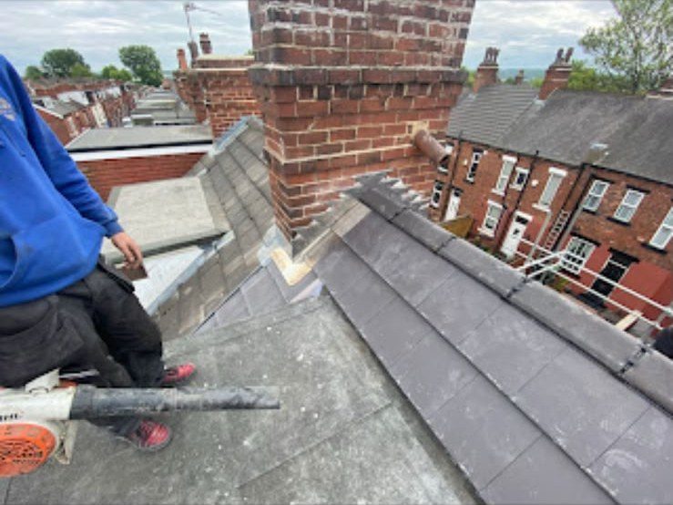 New grey tiled roof being fitted by our roofers