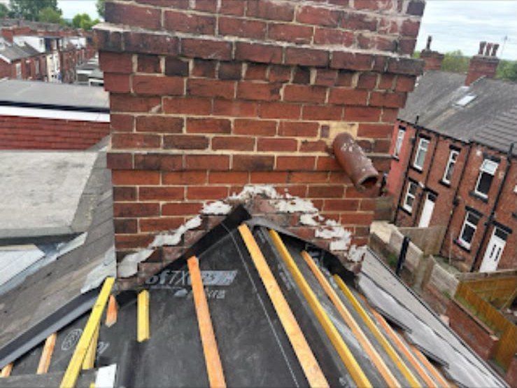 New grey tiled roof being fitted by our roofers