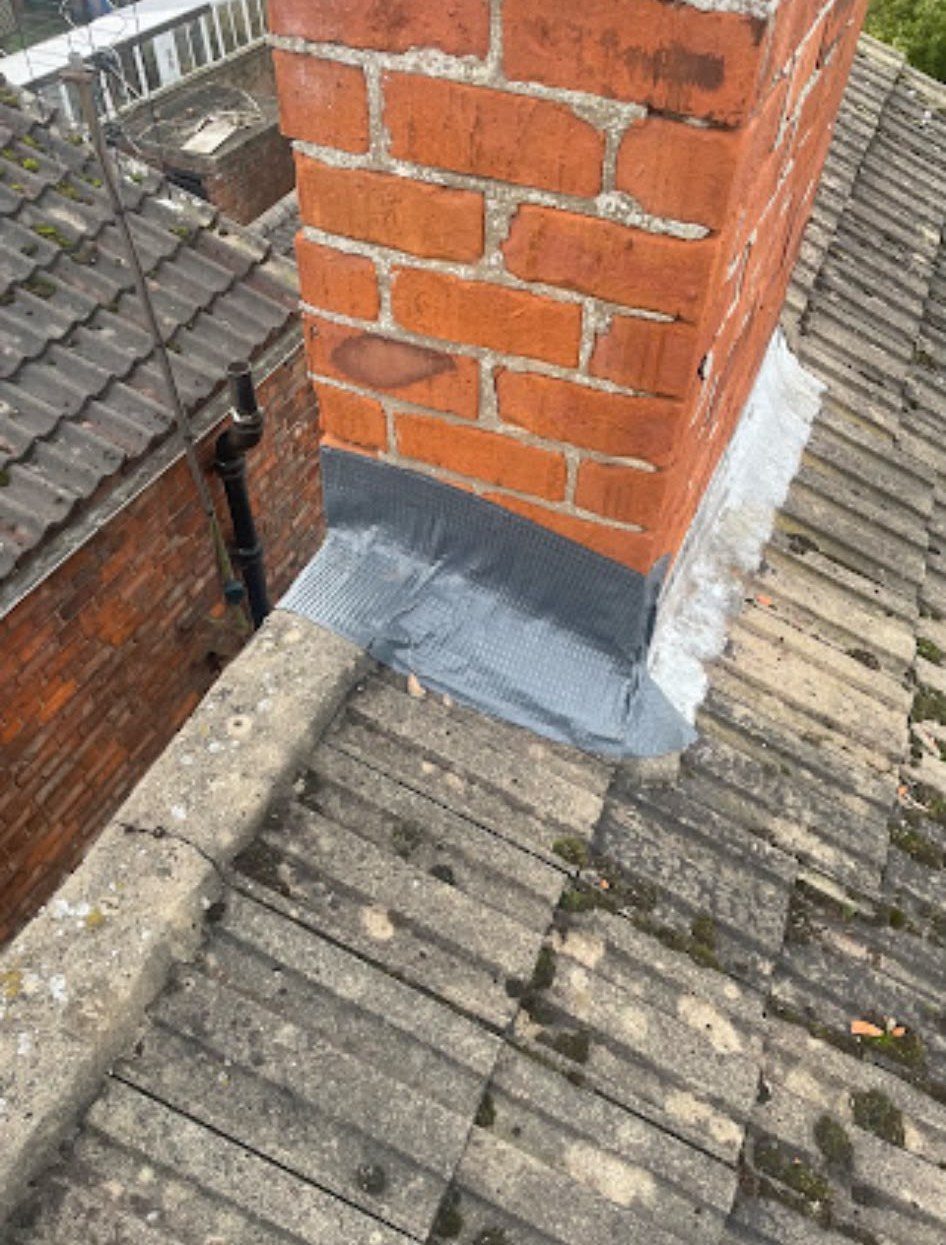 New grey tiled roof being fitted by our roofers