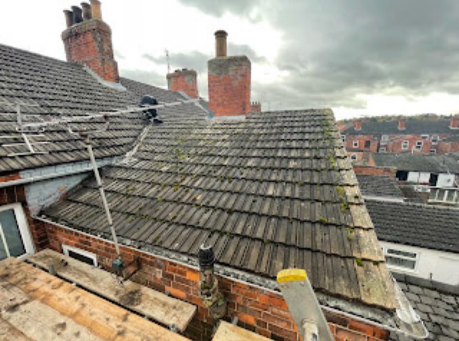 New grey tiled roof being fitted by our roofers