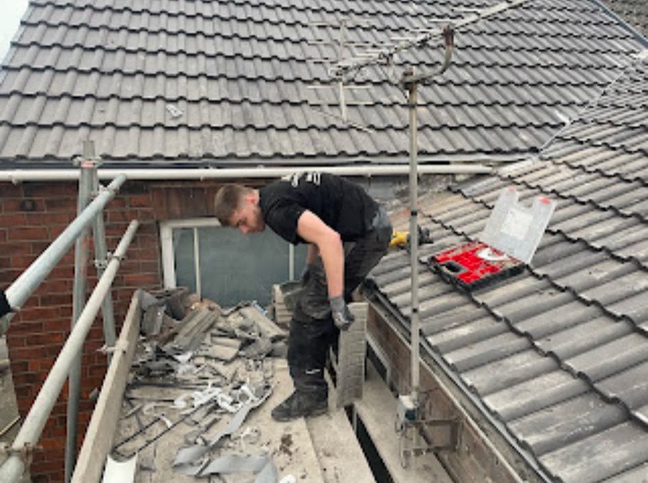 New grey tiled roof being fitted by our roofers